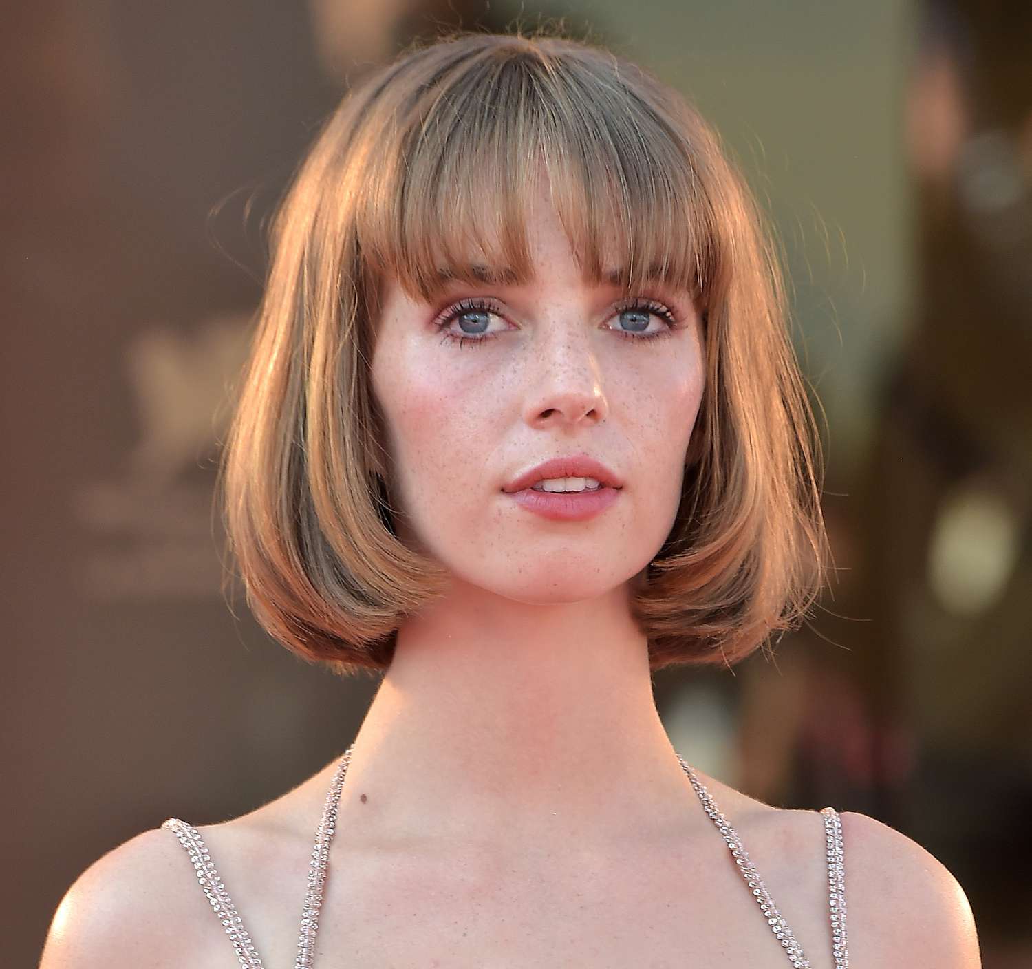 Maya Hawke in a rounded, blown-out bob on the red carpet at Venice Film Festival