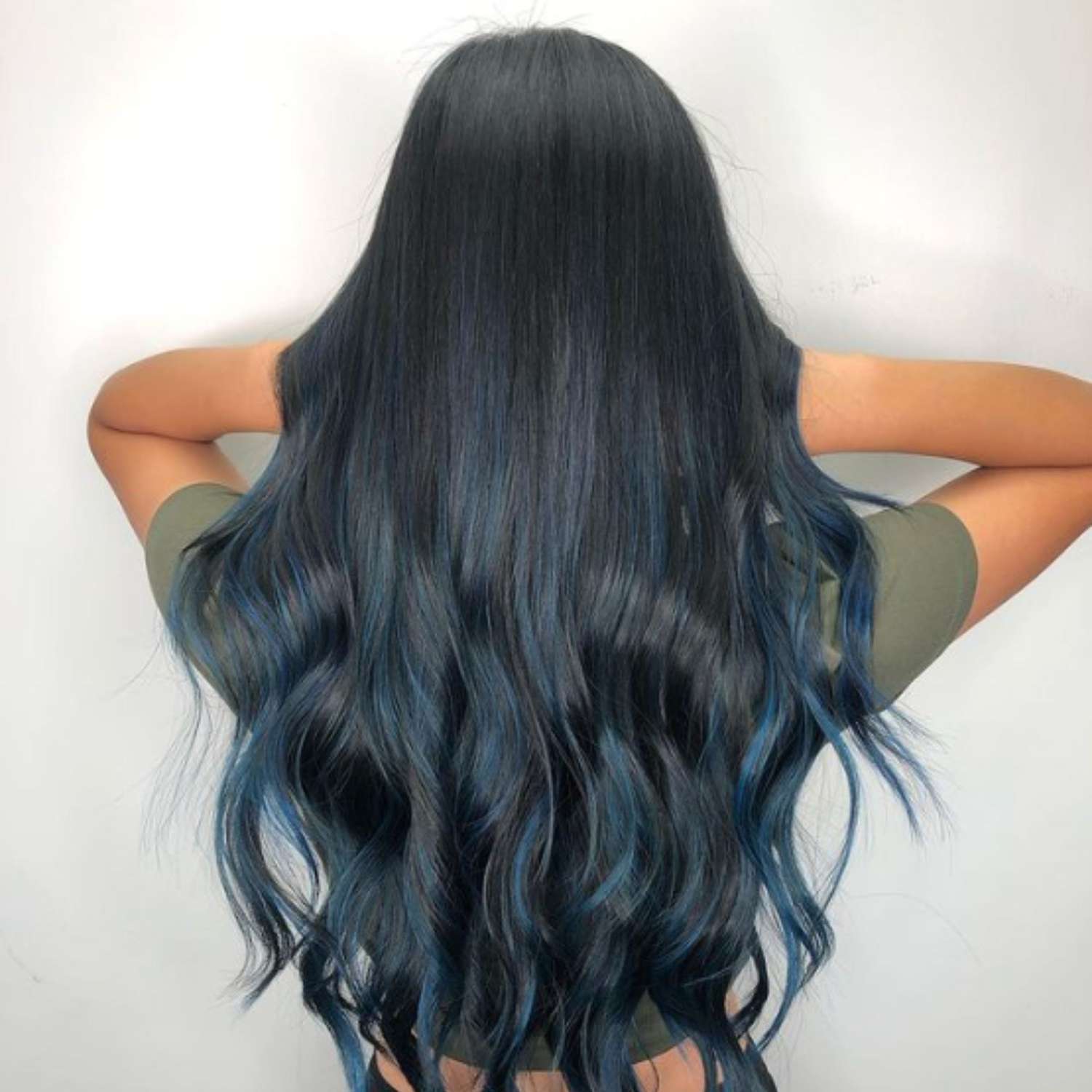 Black hair with blue subtle highlights and ends