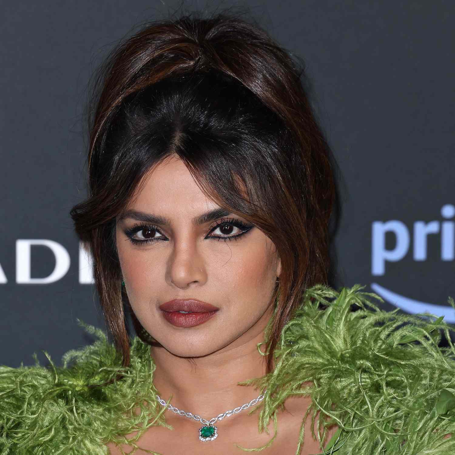 Priyanka Chopra wears a messy updo hairstyle with face-framing layers