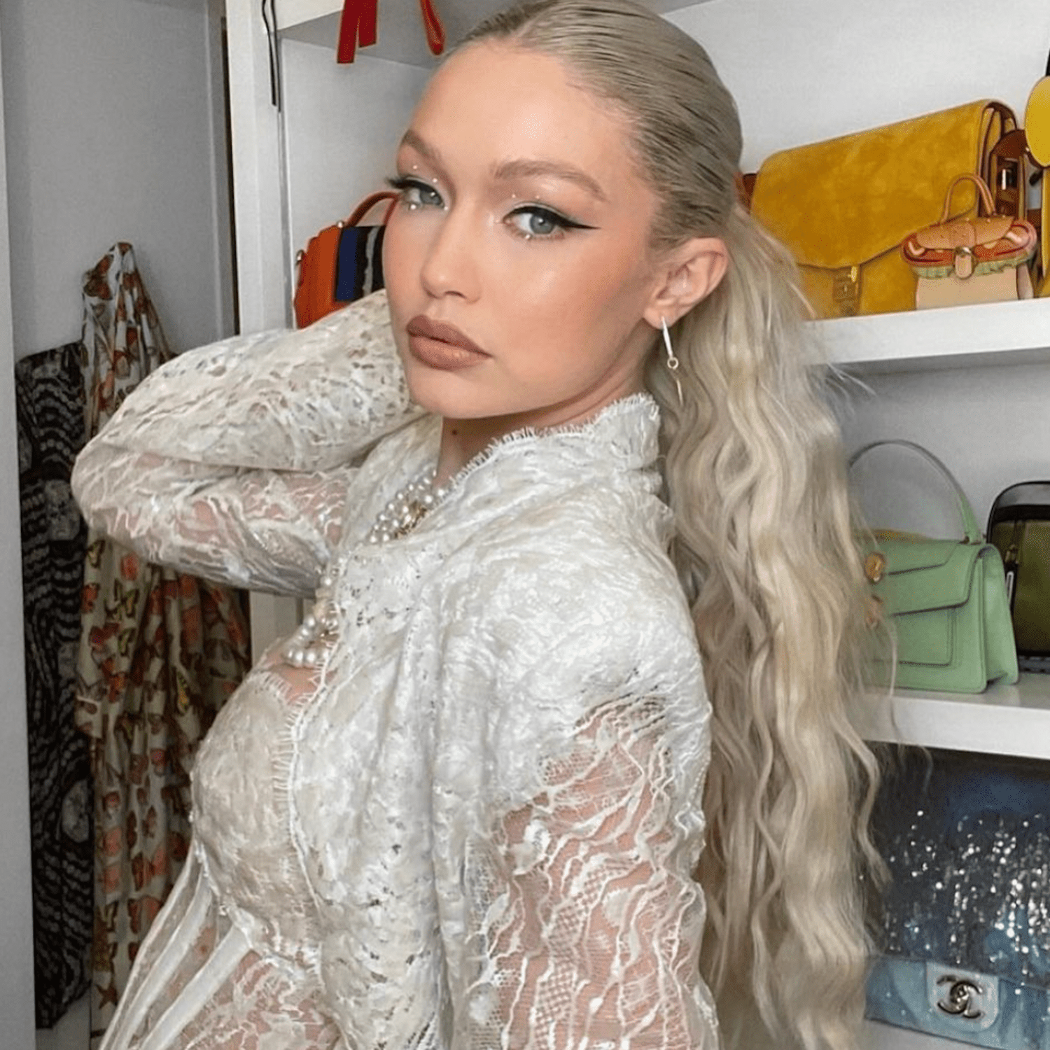 Gigi Hadid wears a wavy mid-height ponytail out to her birthday celebration