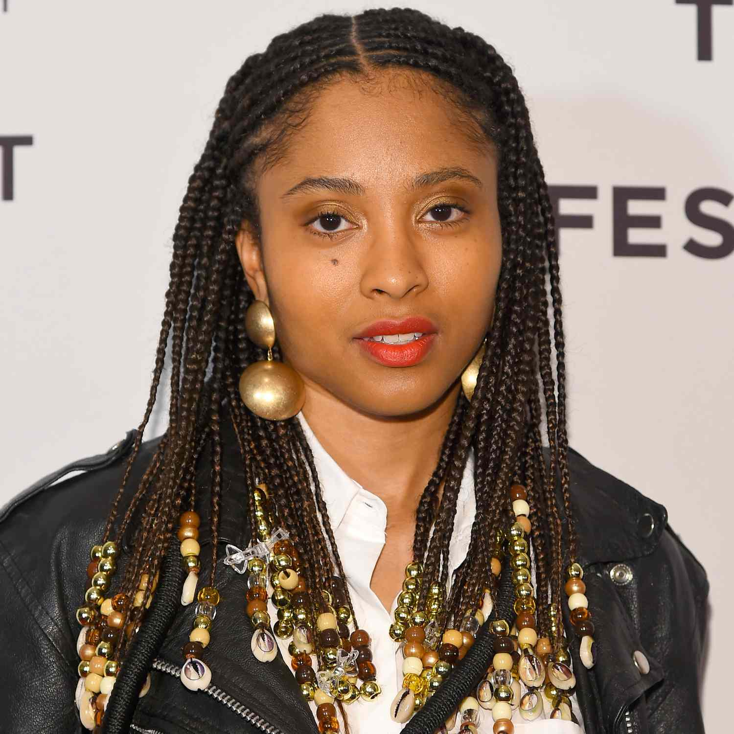 Actor Javana Mundy wears braids with beads at the bottom to Tribeca Film Fest