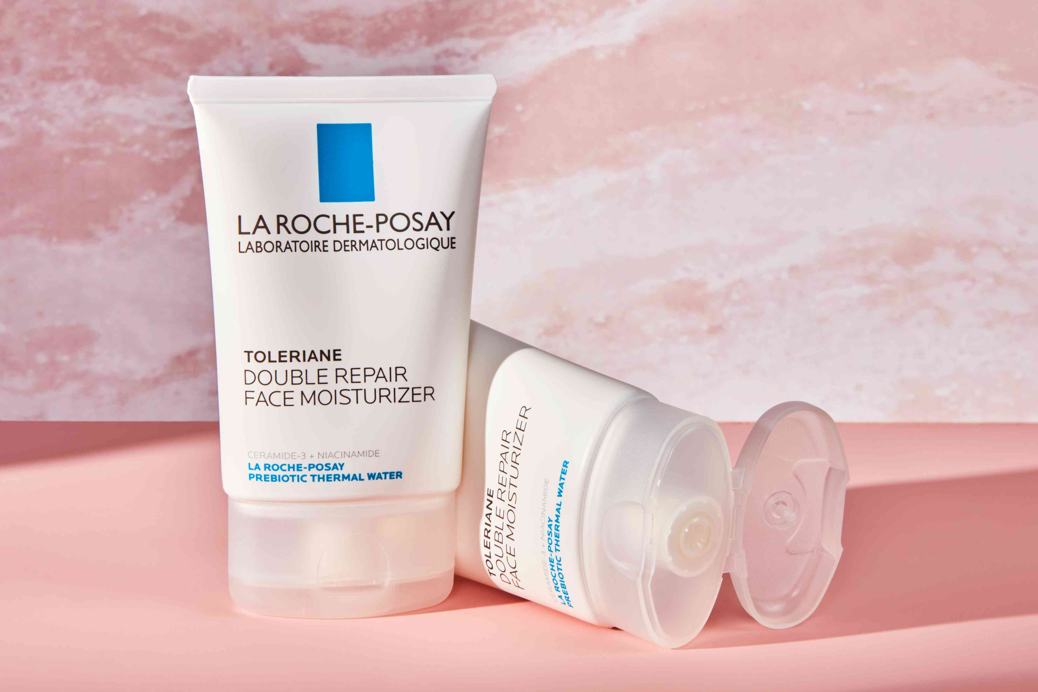 La Roche-Posay Toleriane Double Repair Moisturizer on a pink background