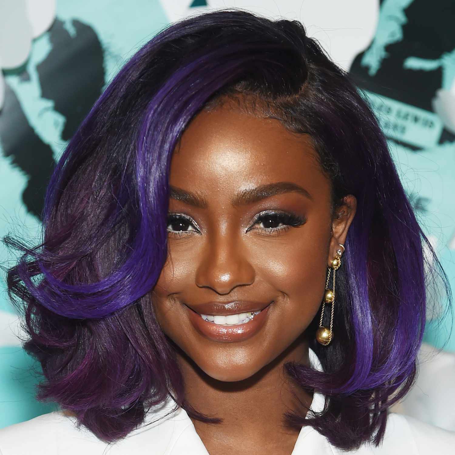 Justine Skye wears old Hollywood shapes with contemporary hair color in her long bob